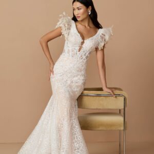Mermaid gown with embellished lace bodice and feathered shoulders