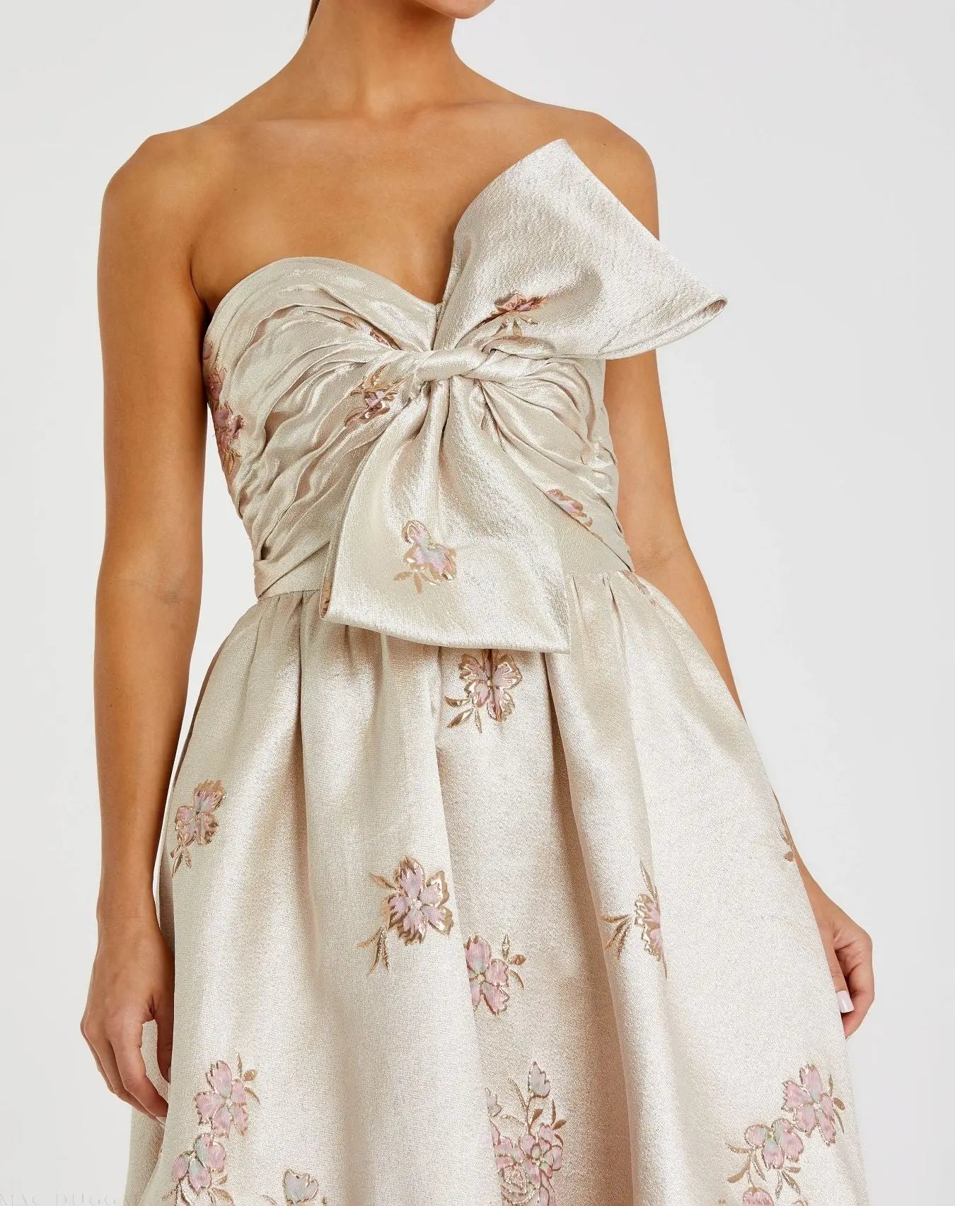 Strapless ball gown with brocade floral fabric and bow detail - Image 2